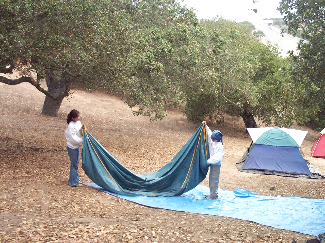 Cleaning up tents.