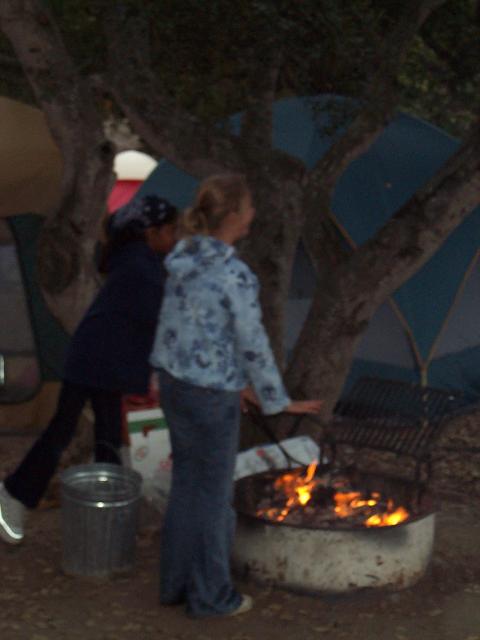 Warming up by the fire.