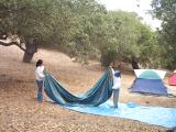 Cleaning up tents.