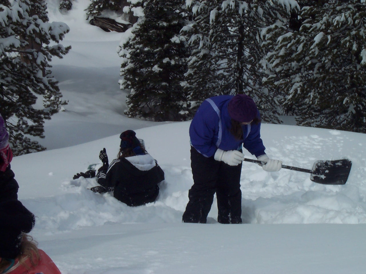 Have someone else remove the snow from the pile you made while digging.