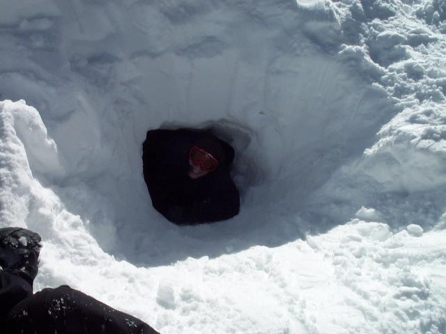 We didn't finish it, but it went pretty far.  To finish it we needed to dig up more, then straight again.  The 'up' part makes sure that your body heat gets trapped inside the cave instead of rising to the outside world.