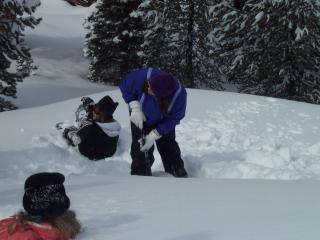 Starting to build a snow cave.  Dig straight down first.