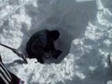 Dig a space that is wide enough for your body and the shovel.