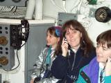 They provides us with listening devices.  You hold it up to your ear and hear the story of the submarine.